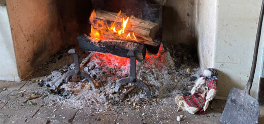 Doll By Fireplace Detail