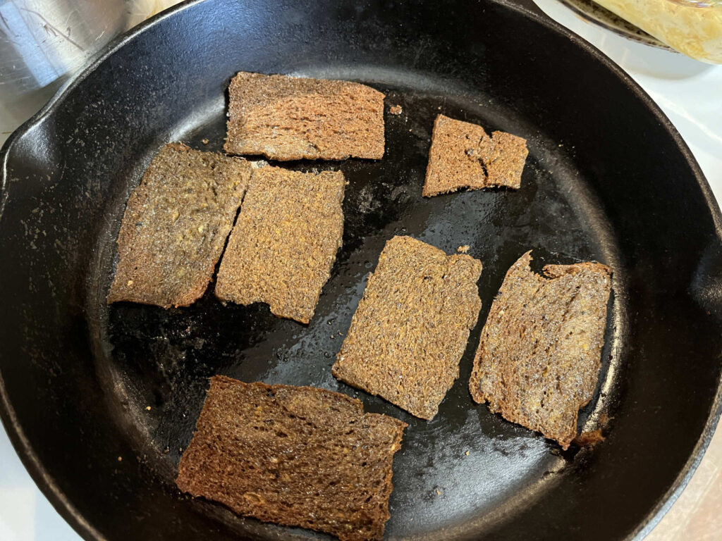 Scrapple fried in cast iron pan